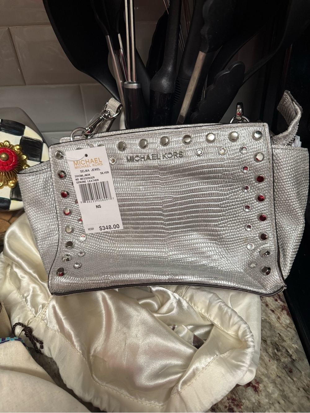 Michael Kors Metallic Silver Studded Wristlet Clutch